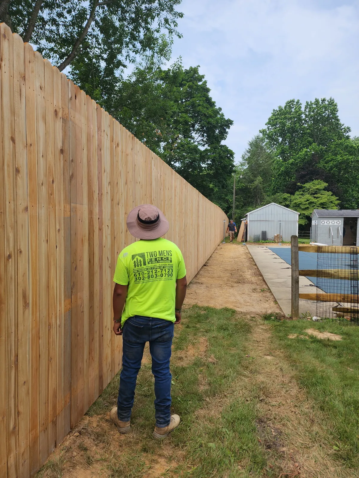 Cedar privacy fence installation by TWOMENS Fence in Delaware