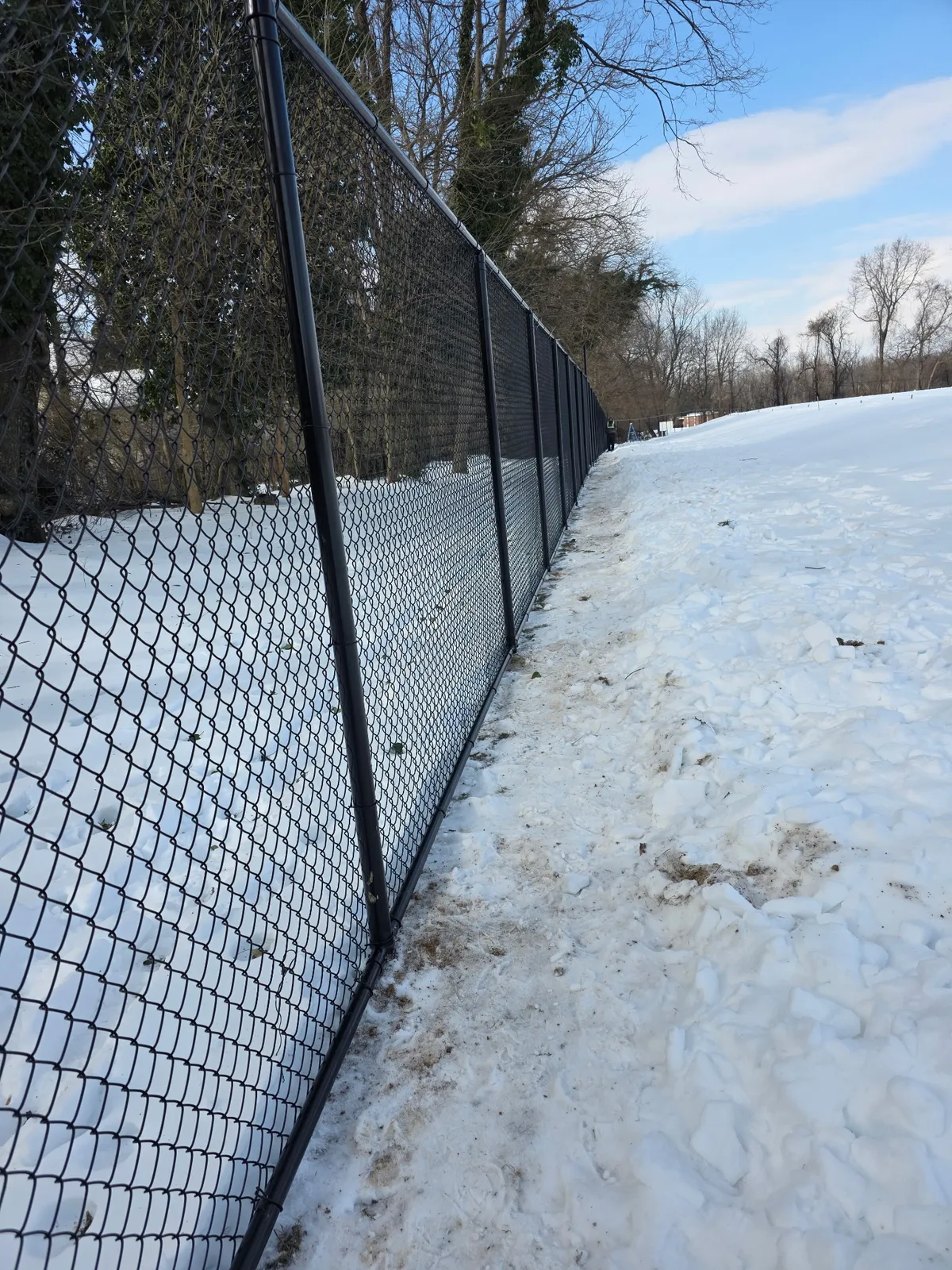 Chain link fence in winter conditions