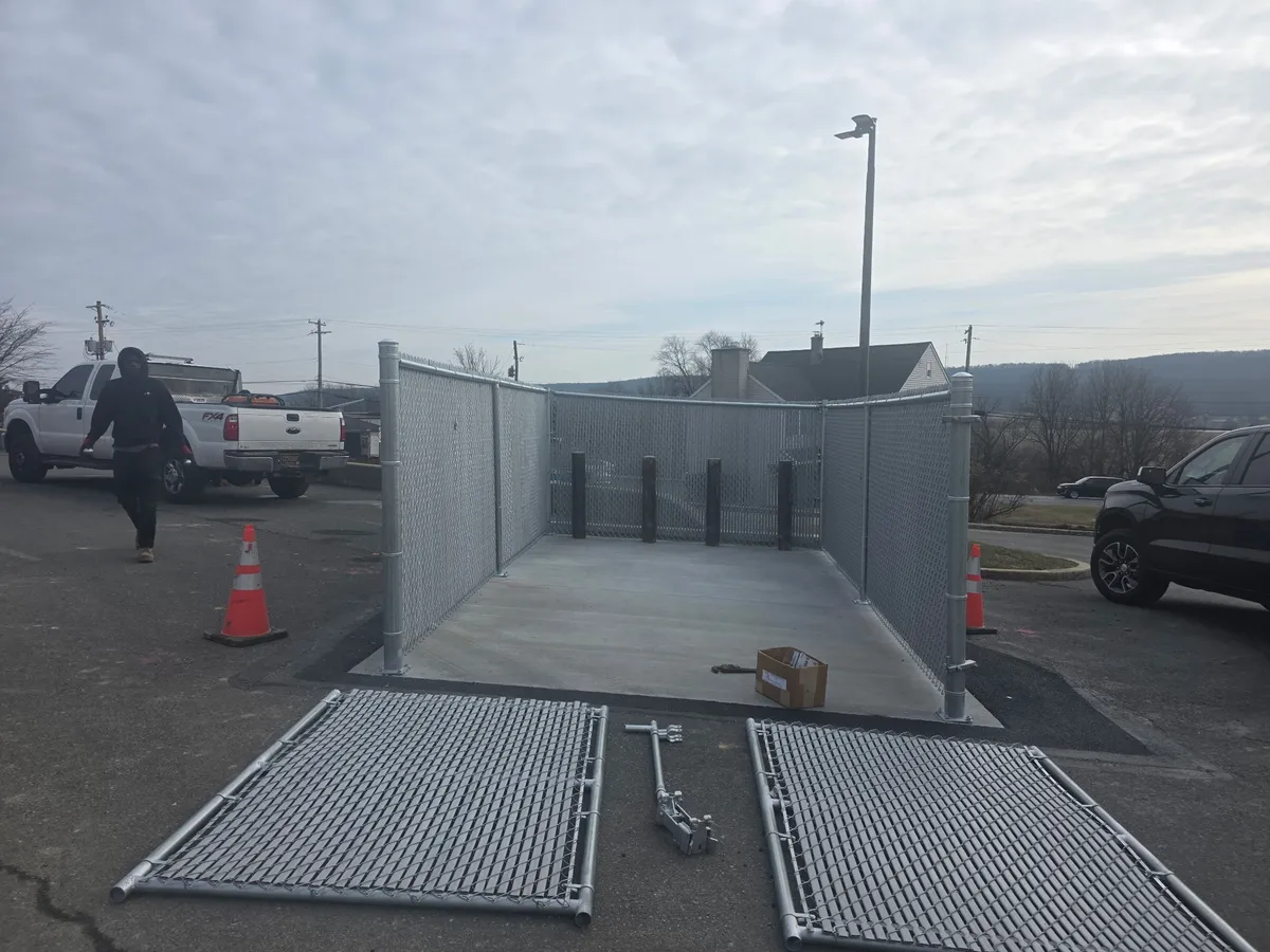 Commercial dumpster enclosure installation