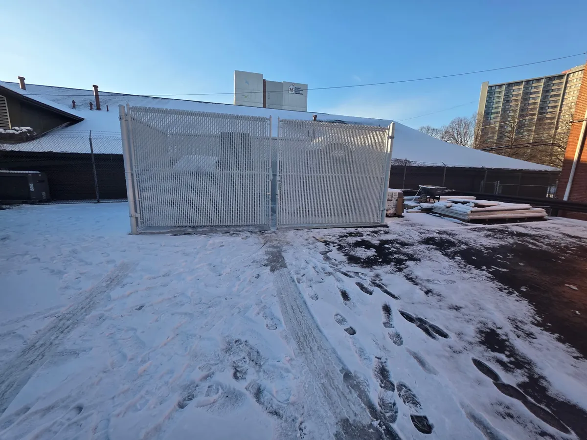 Commercial chain link enclosure at business