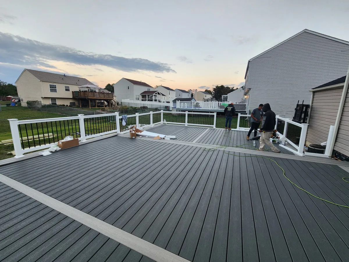 Composite deck build with railing in progress by TWO MEN crew